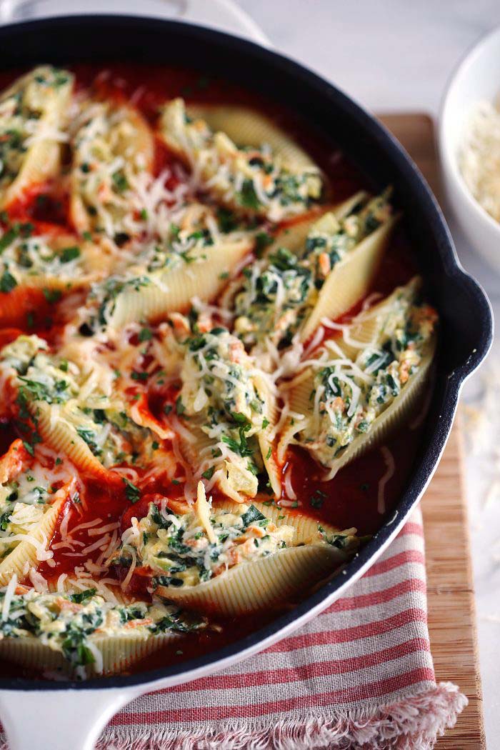 Our family's FAVORITE Skillet Veggie and Cheese Stuffed Shells - the perfect weeknight meal that is delicious and easy to freeze!  eat-yourself-skinny.com