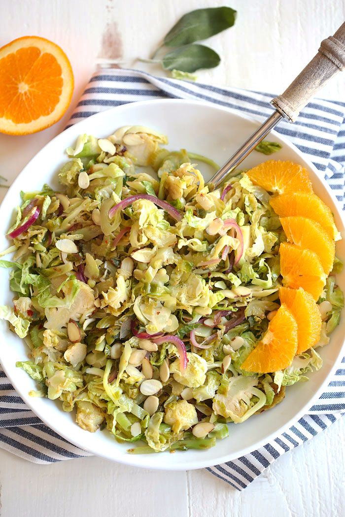 This Warm Brussels Sprouts and Sage Salad is a delicious sweet yet savory dish that is easily thrown together for a quick healthy meal option! eat-yourself-skinny.com