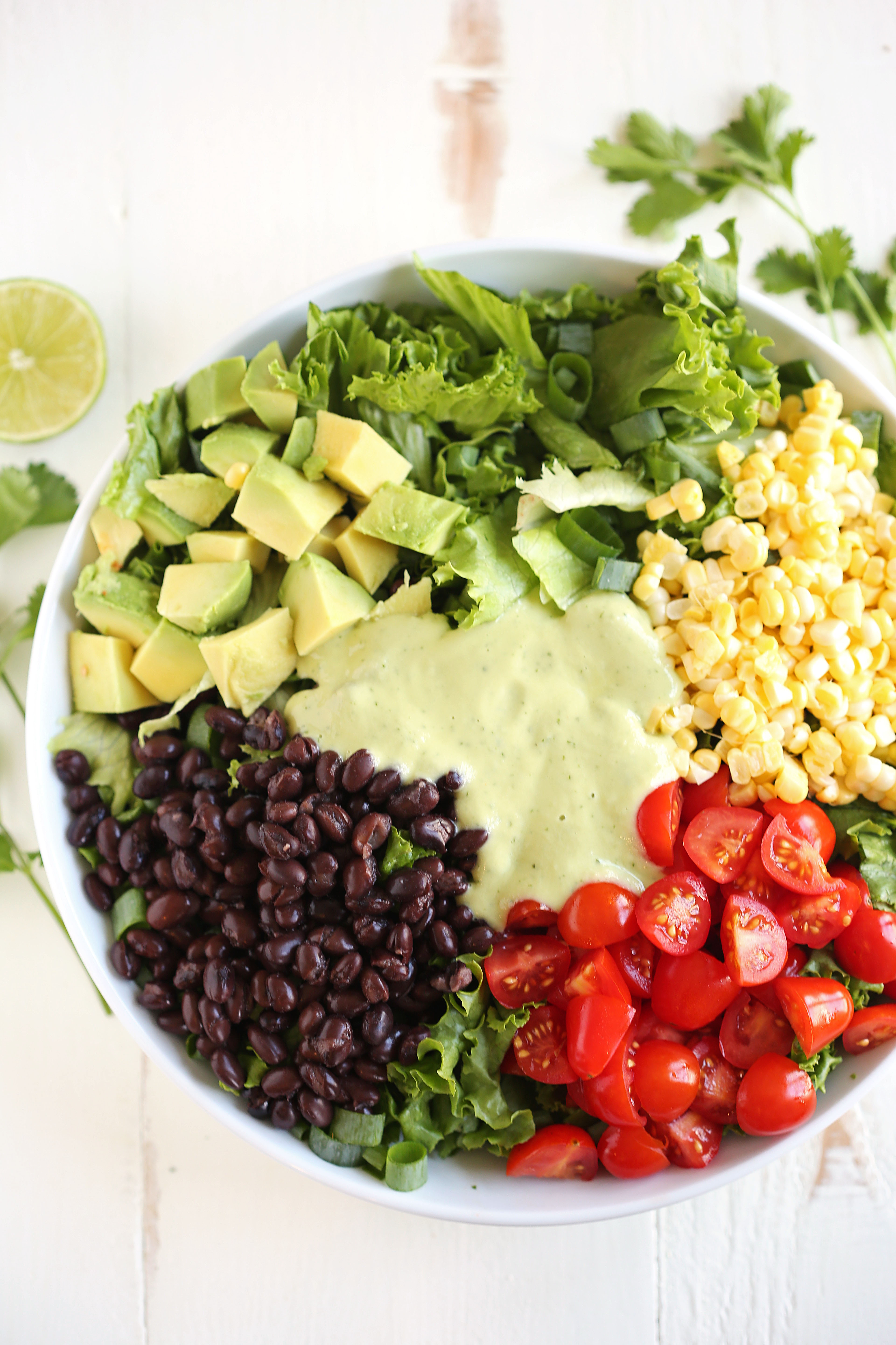 This Southwestern Salad with Creamy Avocado dressing is healthy, crunchy and loaded with tons of veggies!